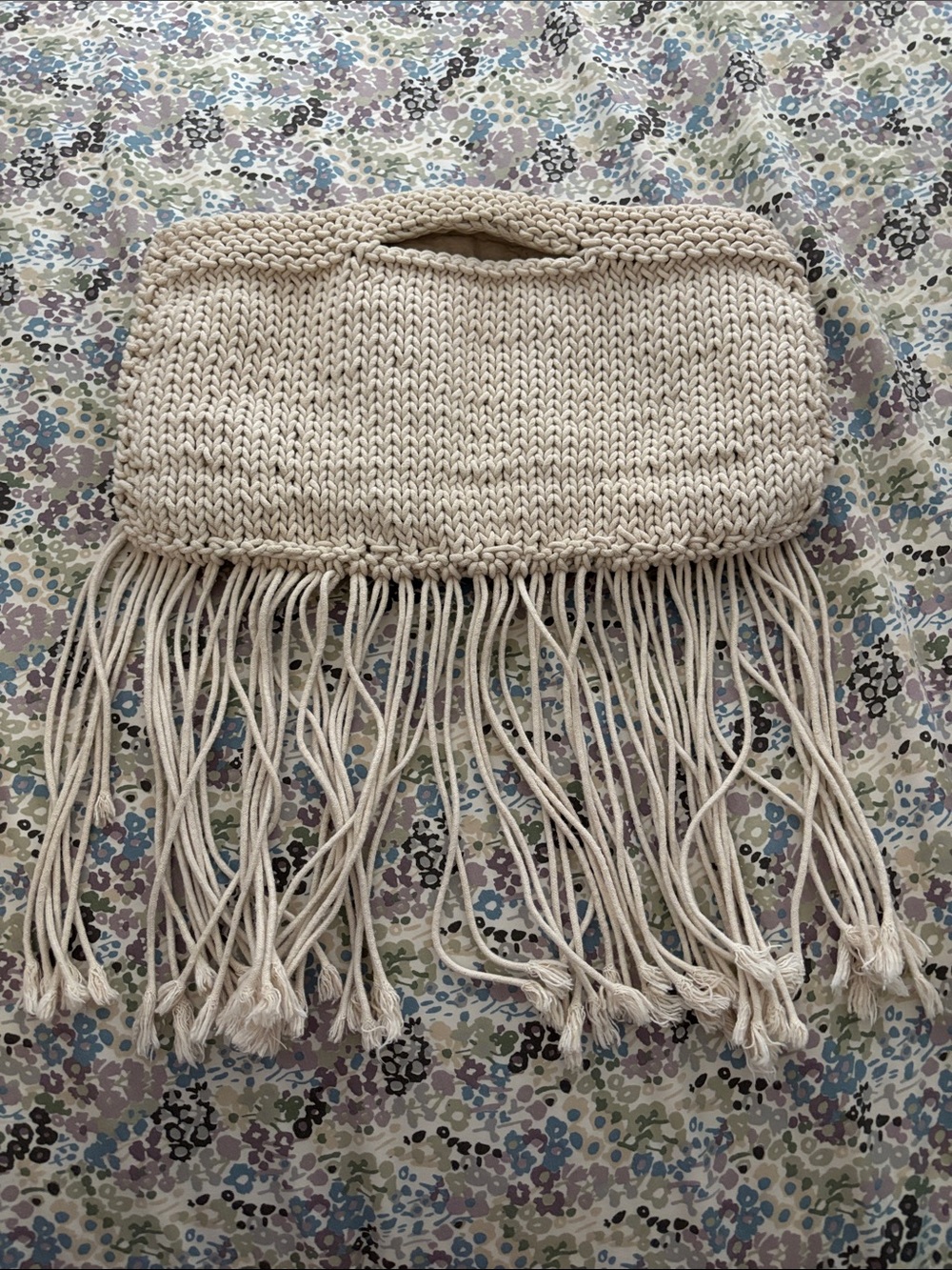 Crochet fringe clutch bag